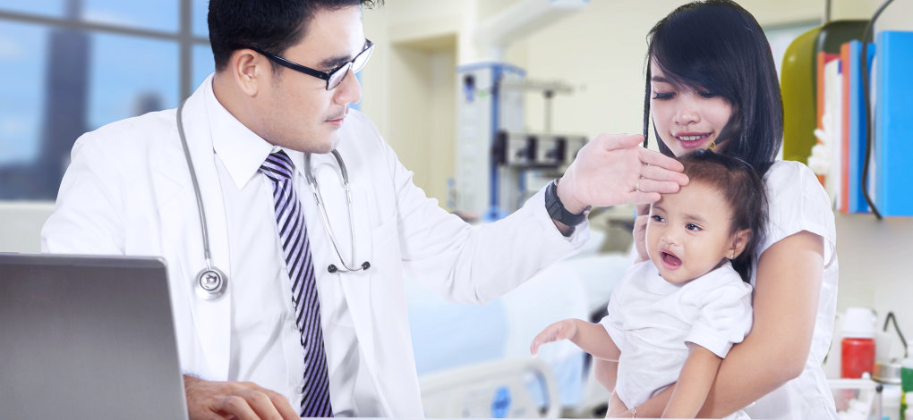 doctor consulting the health of a child